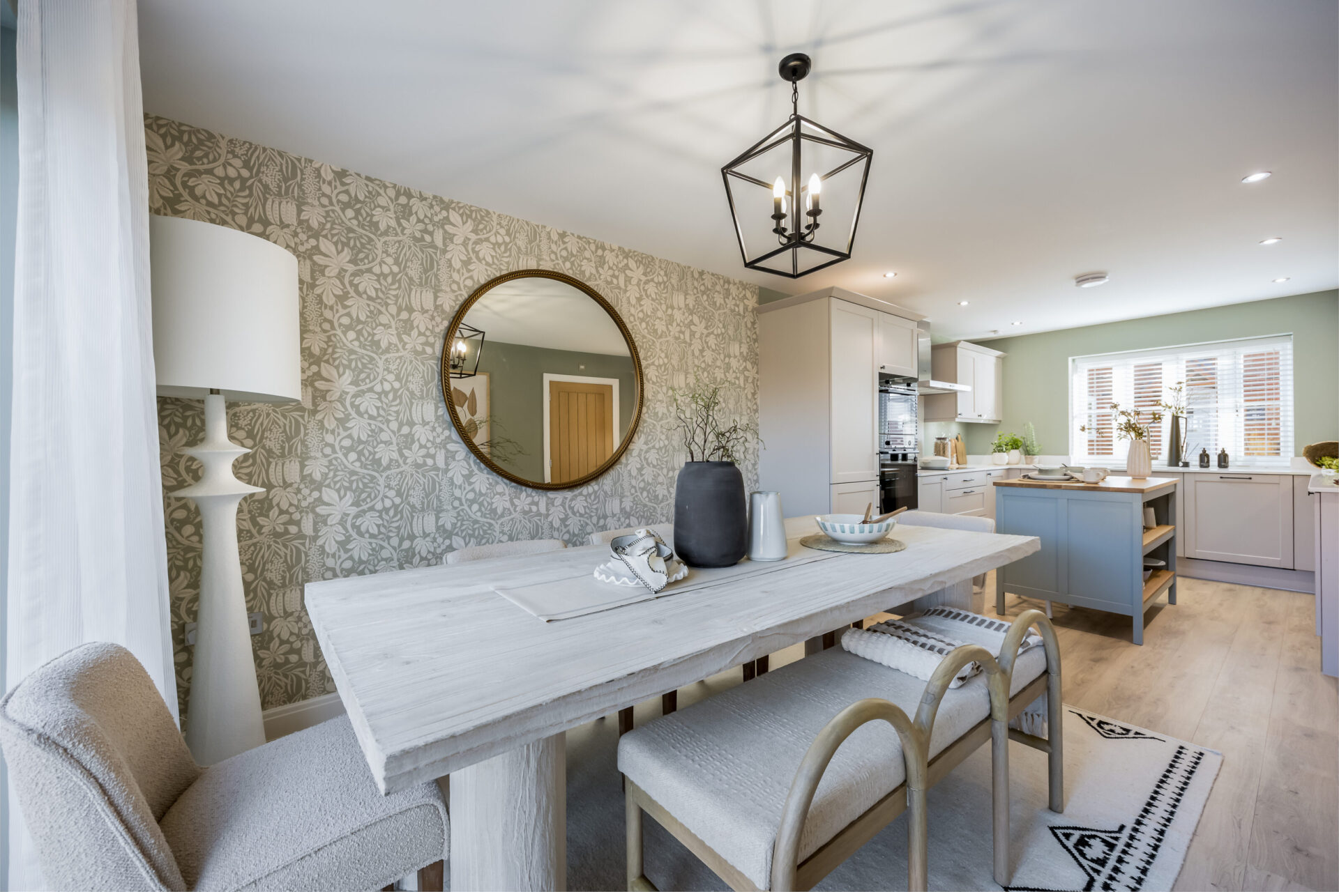 A view of the kitchen and dining area inside the Morden home by Wyatt Homes.