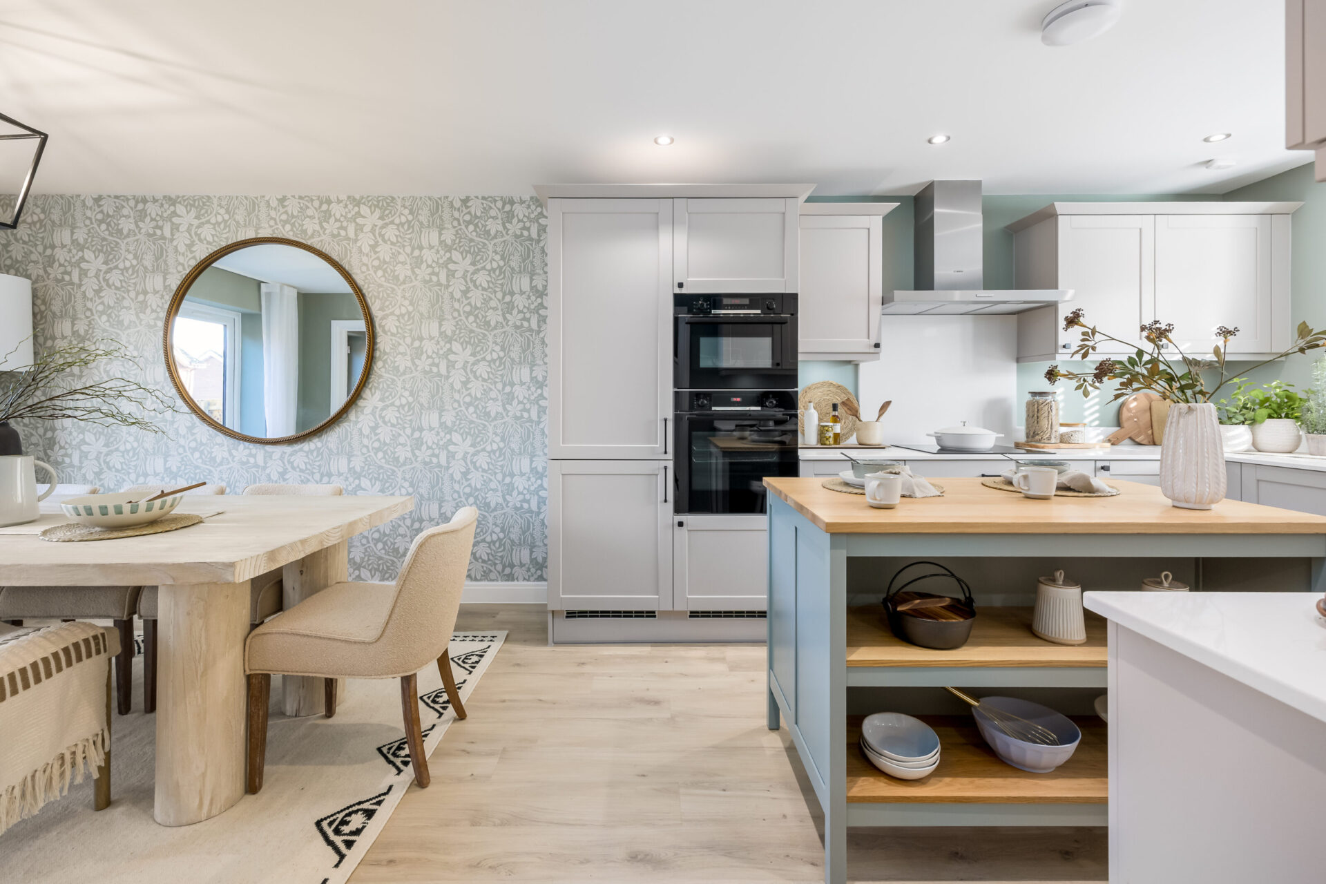 A view of the kitchen and dining area inside the Morden home by Wyatt Homes.