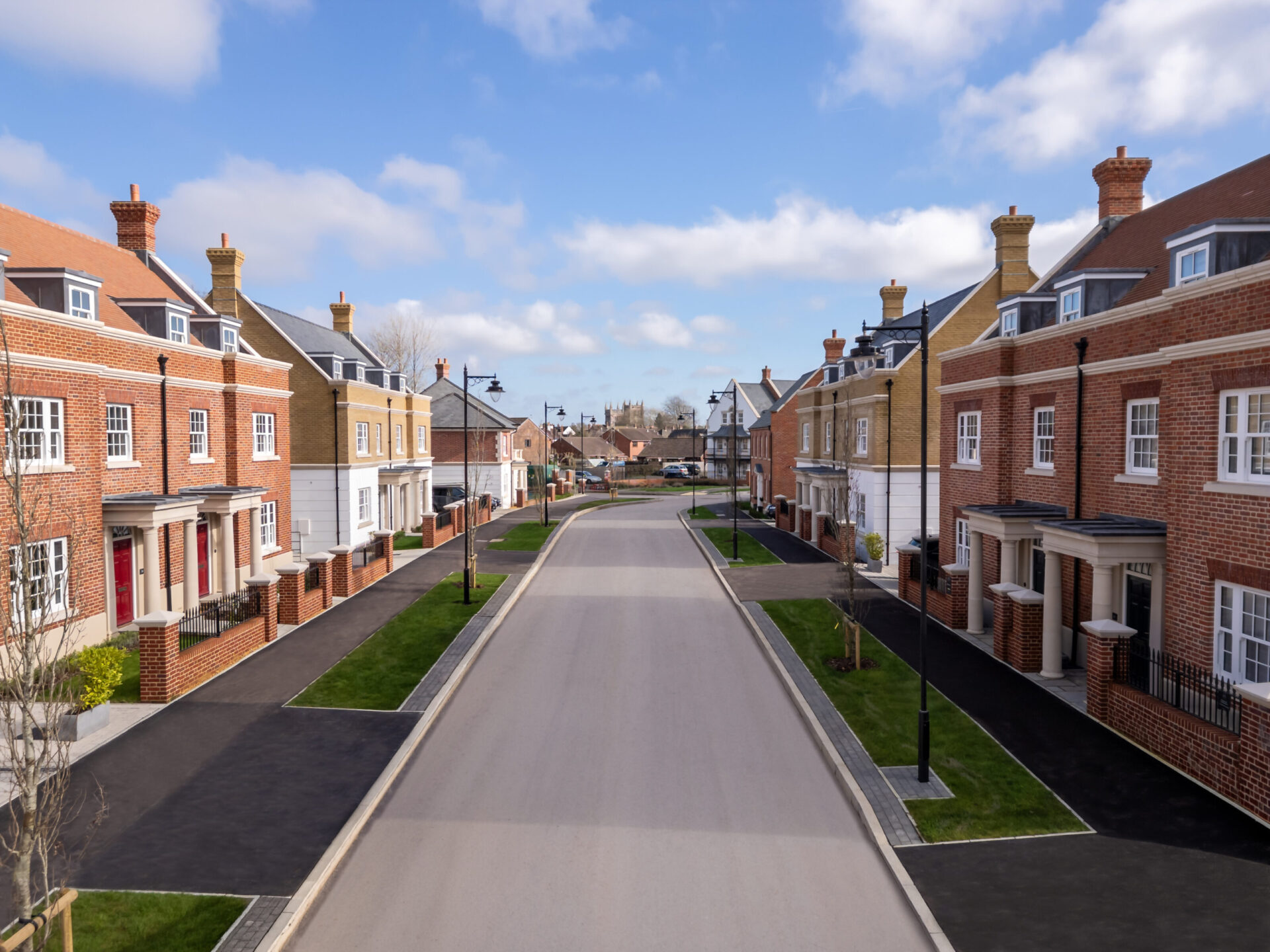 A street scene at Rivers Edge in Wimborne, with a view of Wimborne Minster.